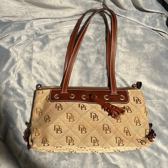 Dooney & Bourke Handbags - Vintage DOONEY AND BOURKE DB Tassel Brown Canvas and Leather SHOULDER BAG‎